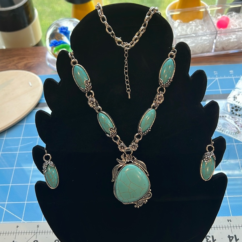 Bohemian style turquoise necklace and matching earrings.